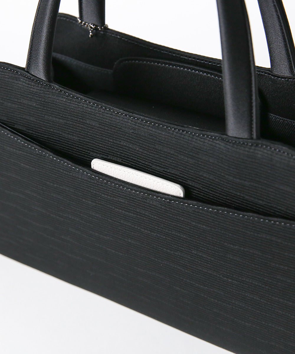 タッセル付き米沢織トート型フォーマルバッグ