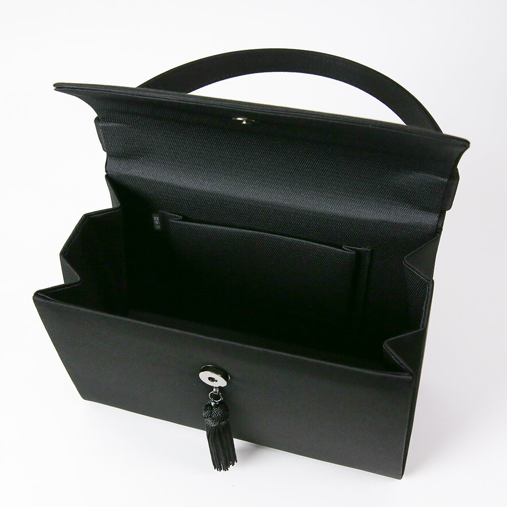 Cord embroidered formal bag with removable tassel