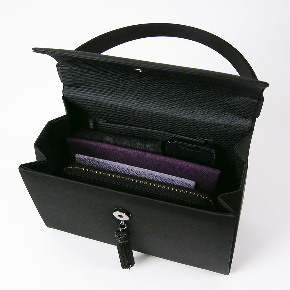 Cord embroidered formal bag with removable tassel