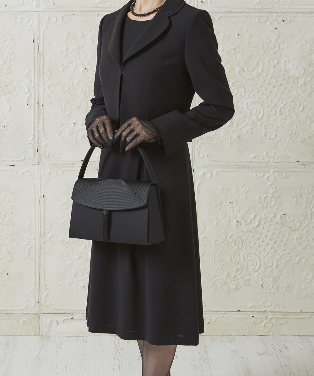 Cord embroidered formal bag with removable tassel