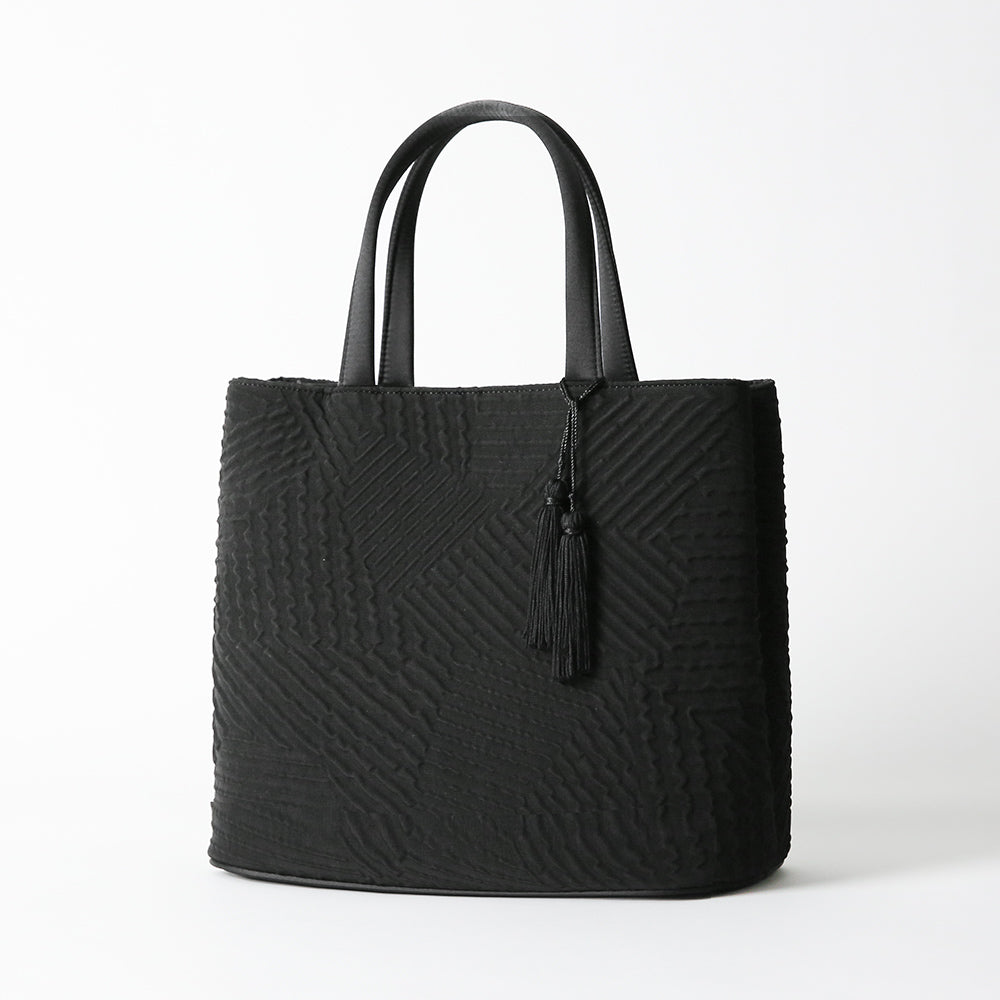 タッセル付きジオメトリック二層式バッグ