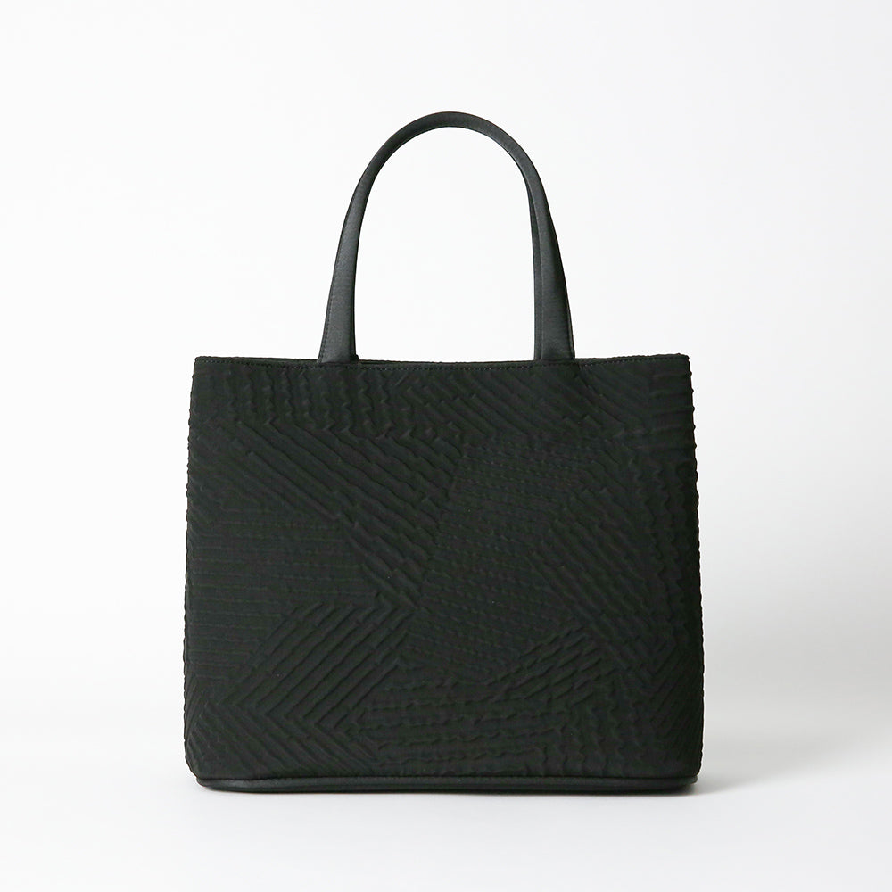 タッセル付きジオメトリック二層式バッグ