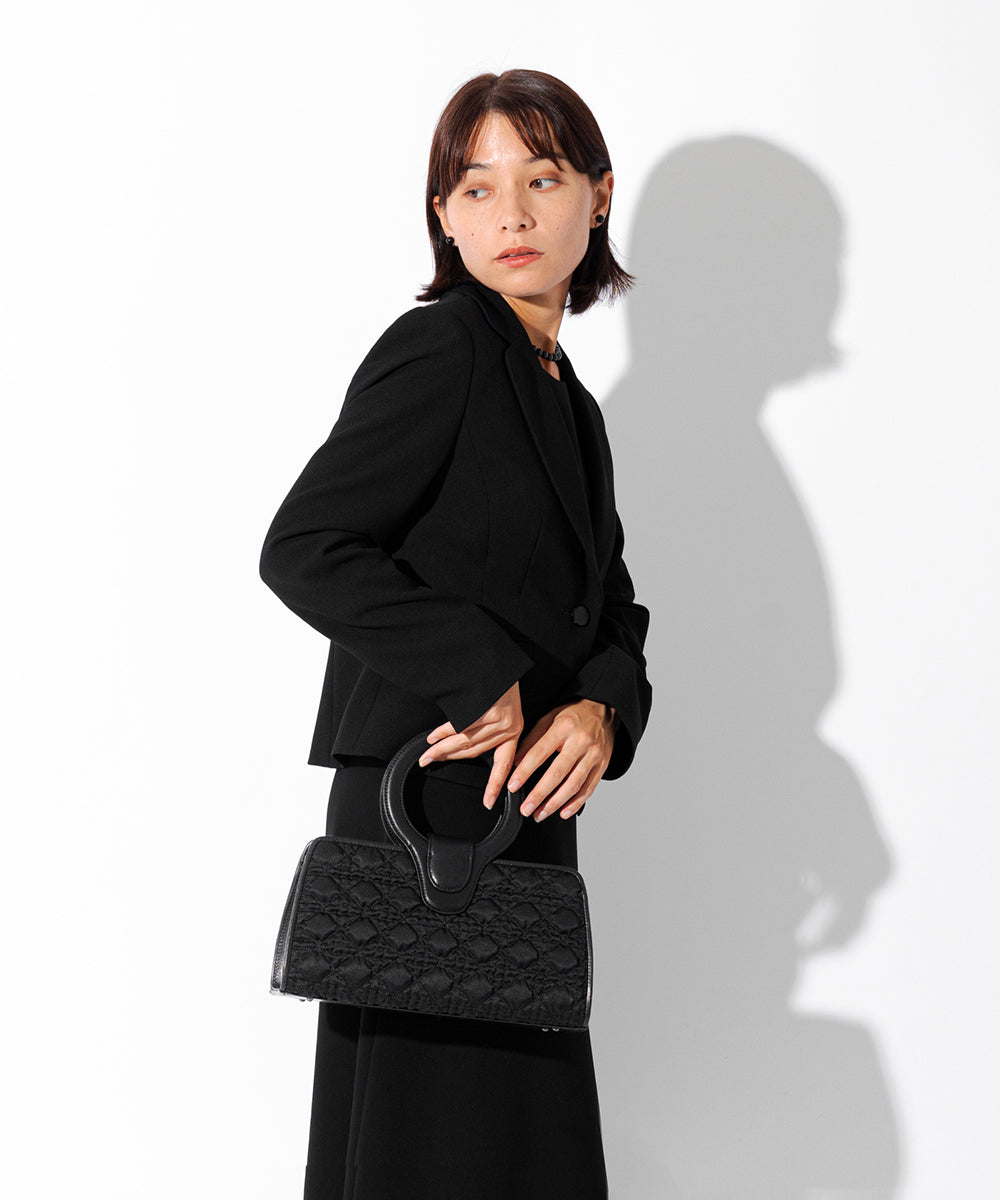 Genuine Leather Circle Handle Quilted Bag