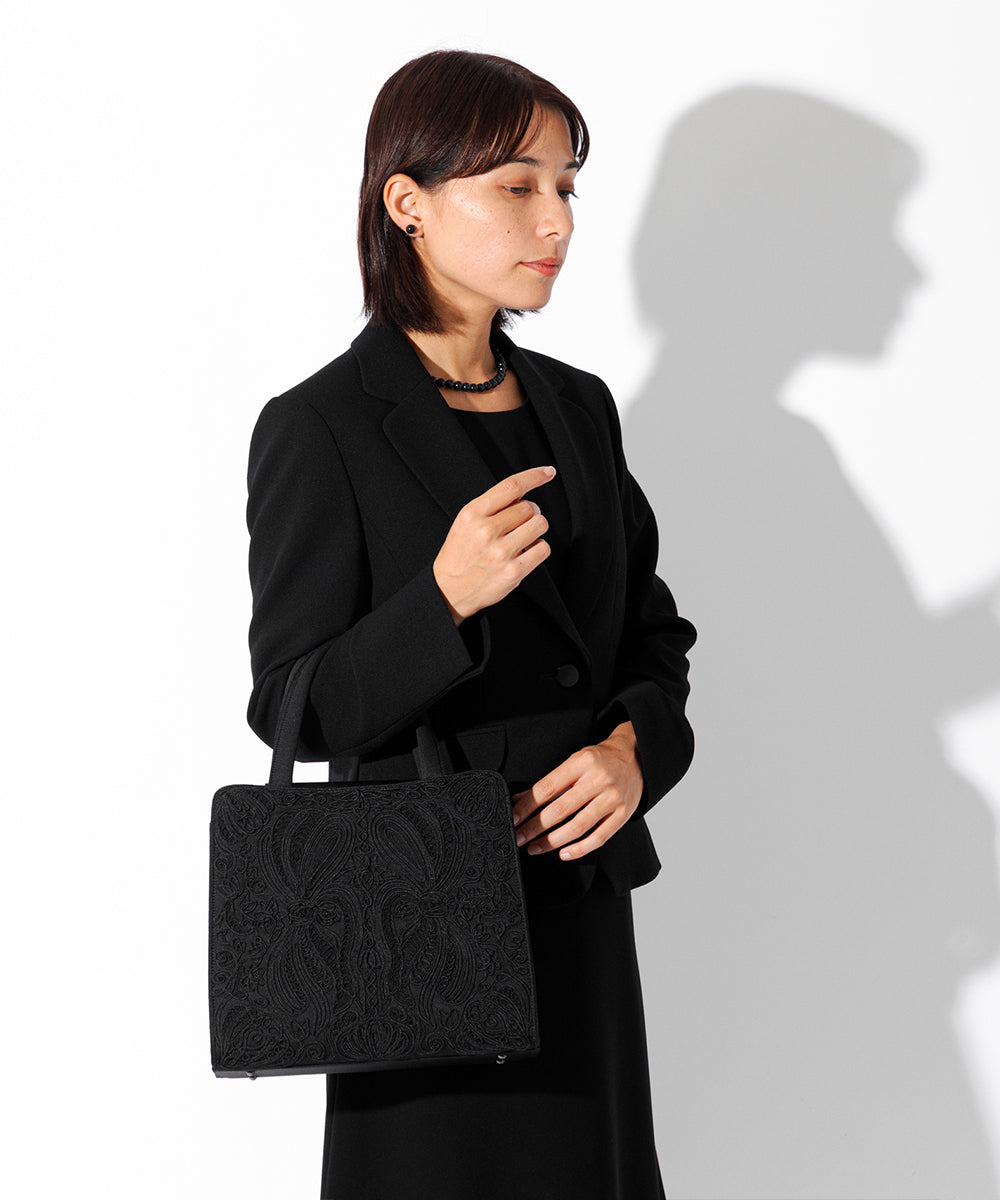 Inner magnetic cord embroidery tote formal bag