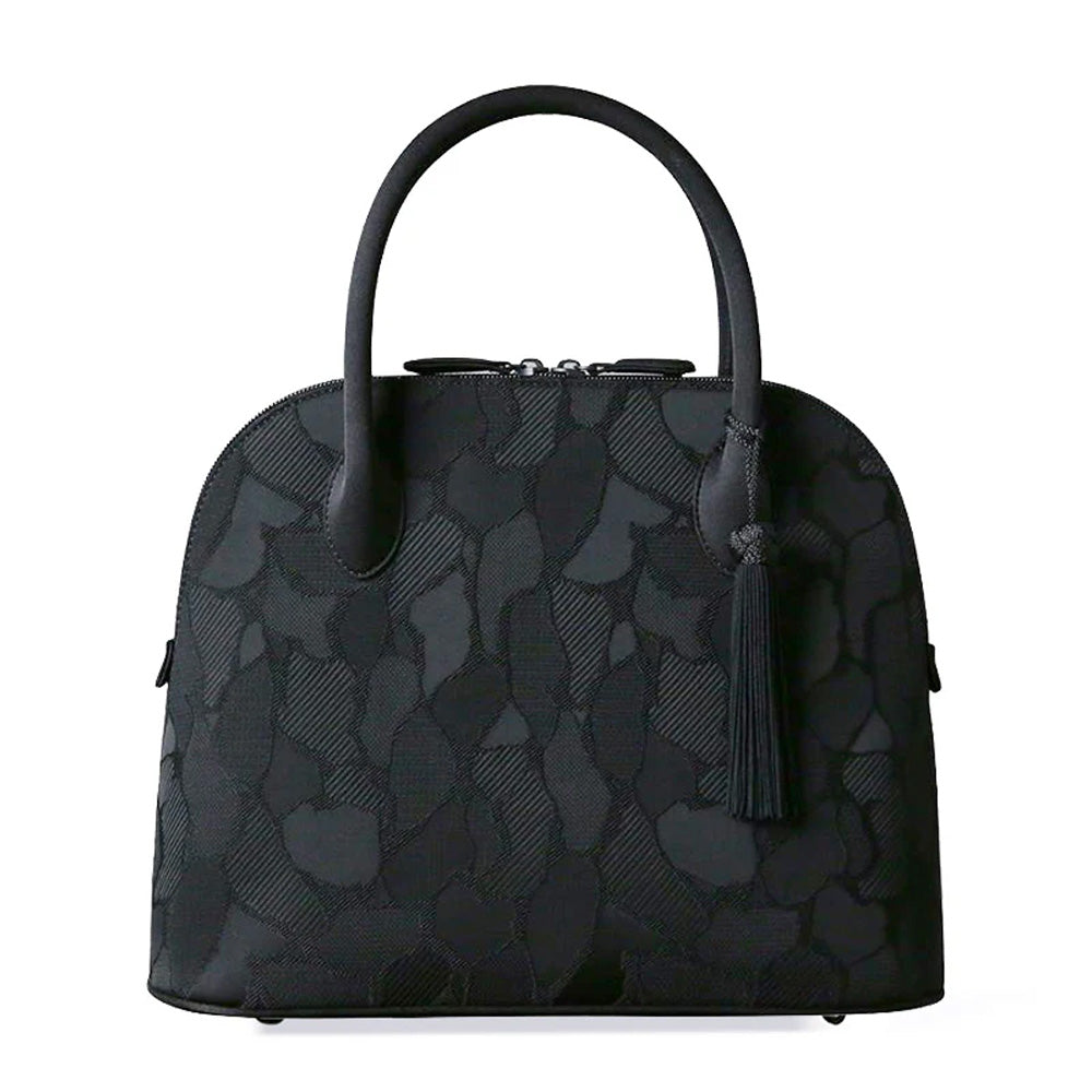 Yonezawa woven round zipper bag with tassel