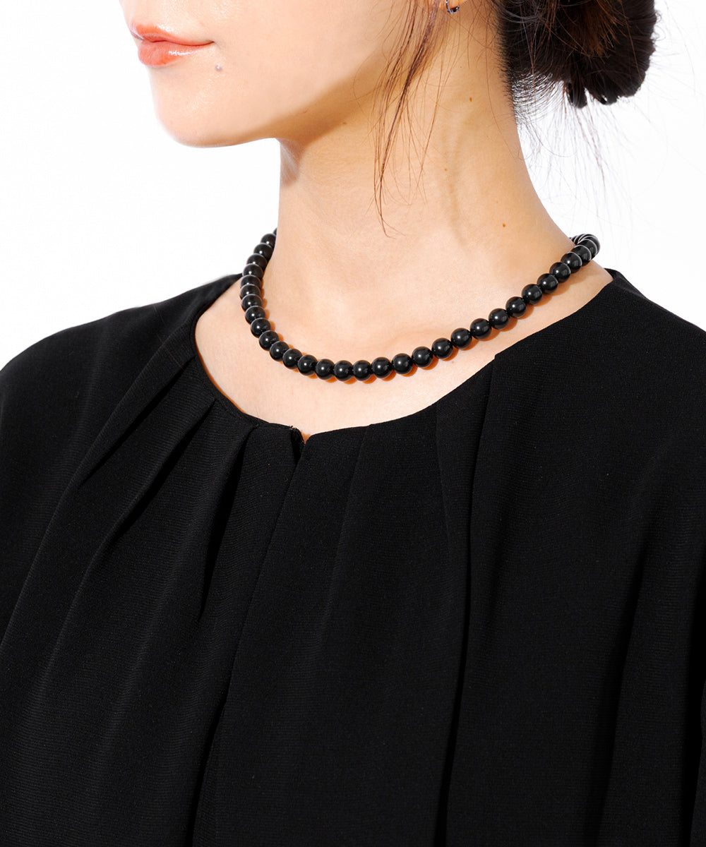 タックデザインゆったり前開きワンピース