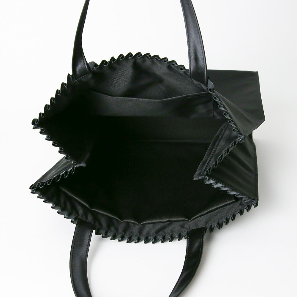 Frilled grosgrain handbag