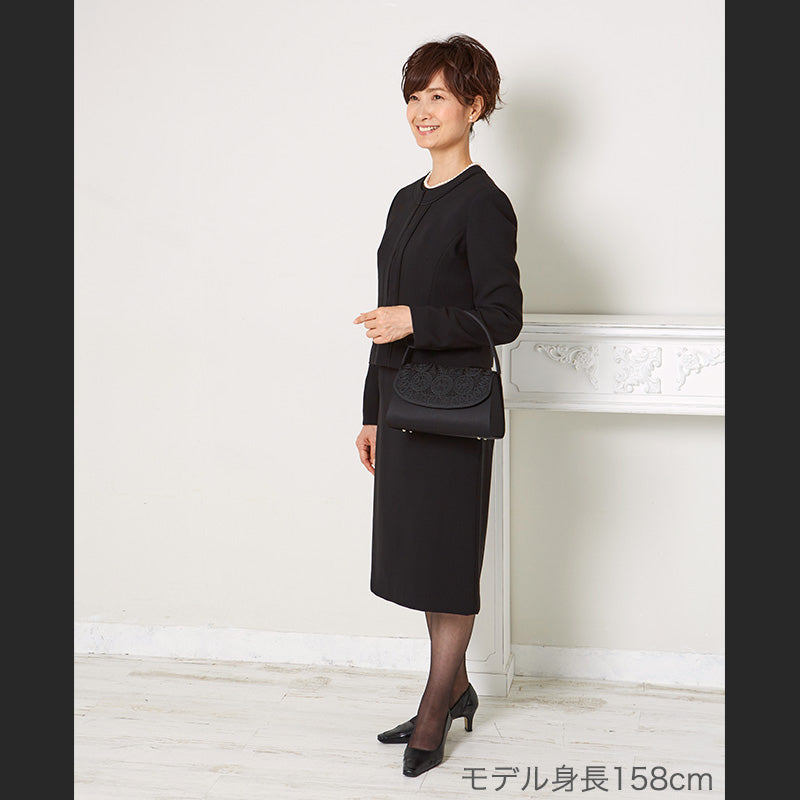Formal bag with cord embroidery