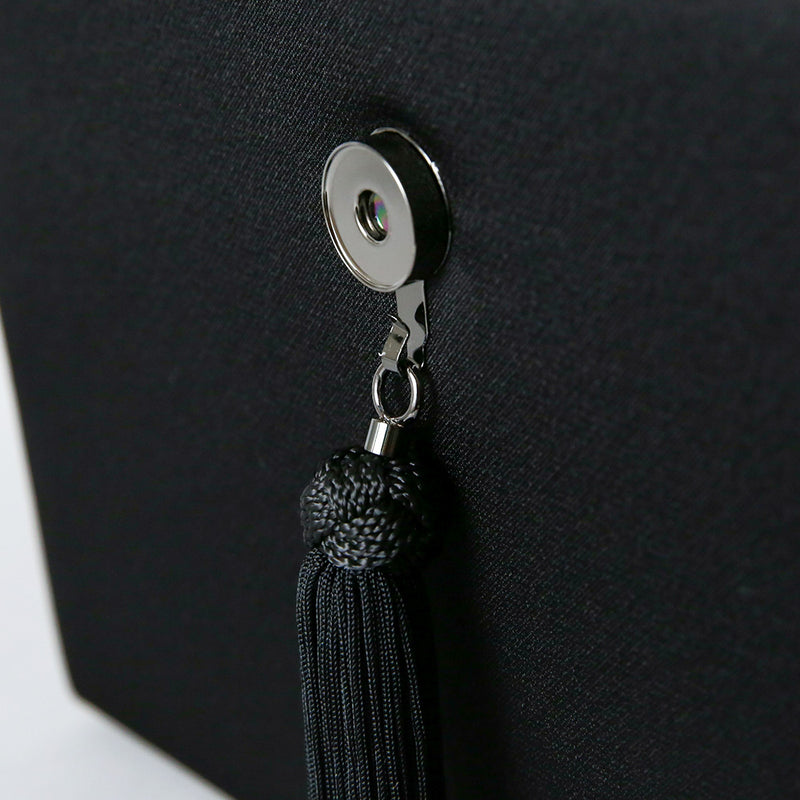 Cord embroidered formal bag with removable tassel